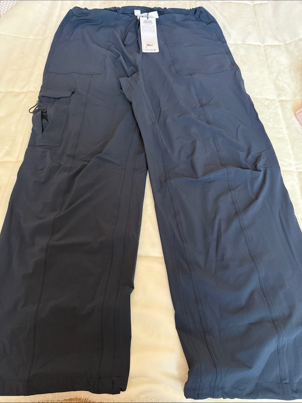 Women’s Dark Navy Cargo Pants. Slick lightweight material. Drawstring waist.